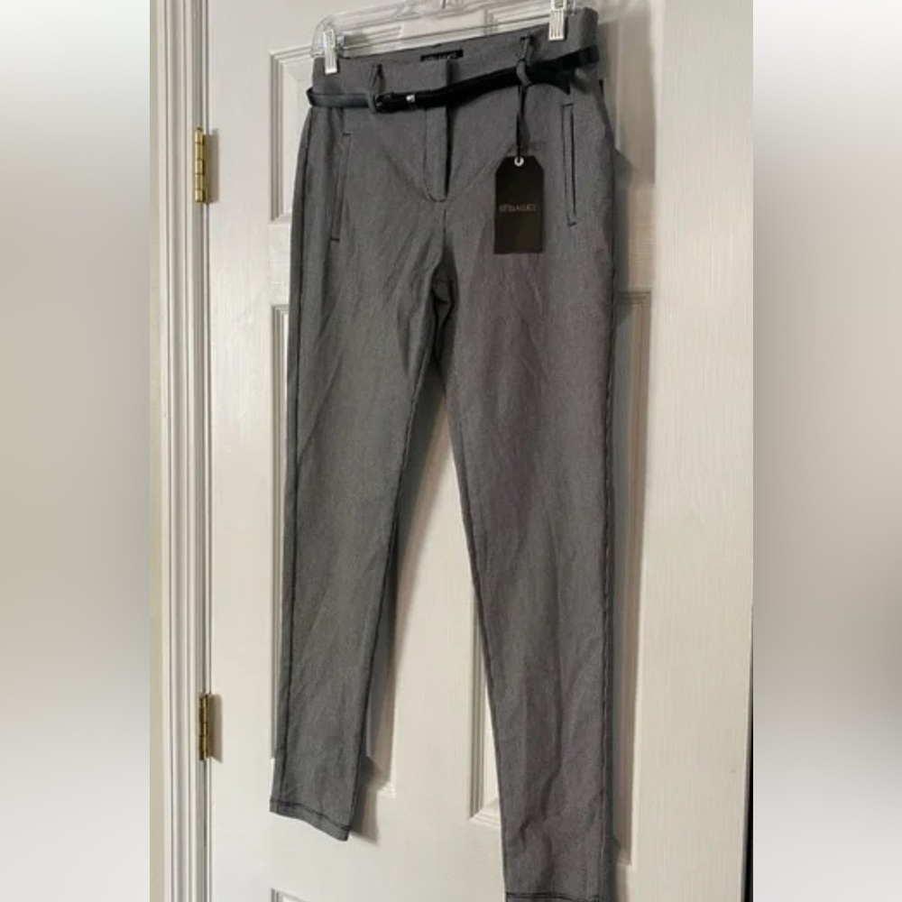 Stretch black and white skinny pants with belt